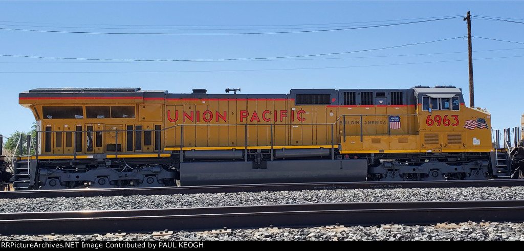 Side Shot of UP 6963 as She Pulls westbound towards the Center of The UP Yermo Yard 